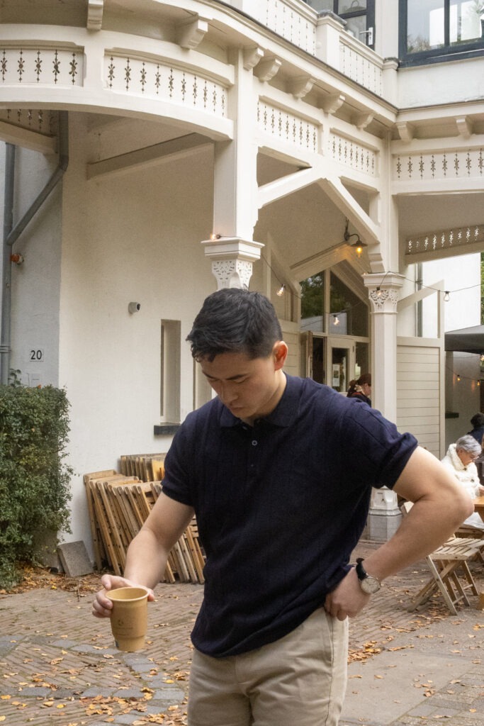 dating photo of a man with a cup of coffee